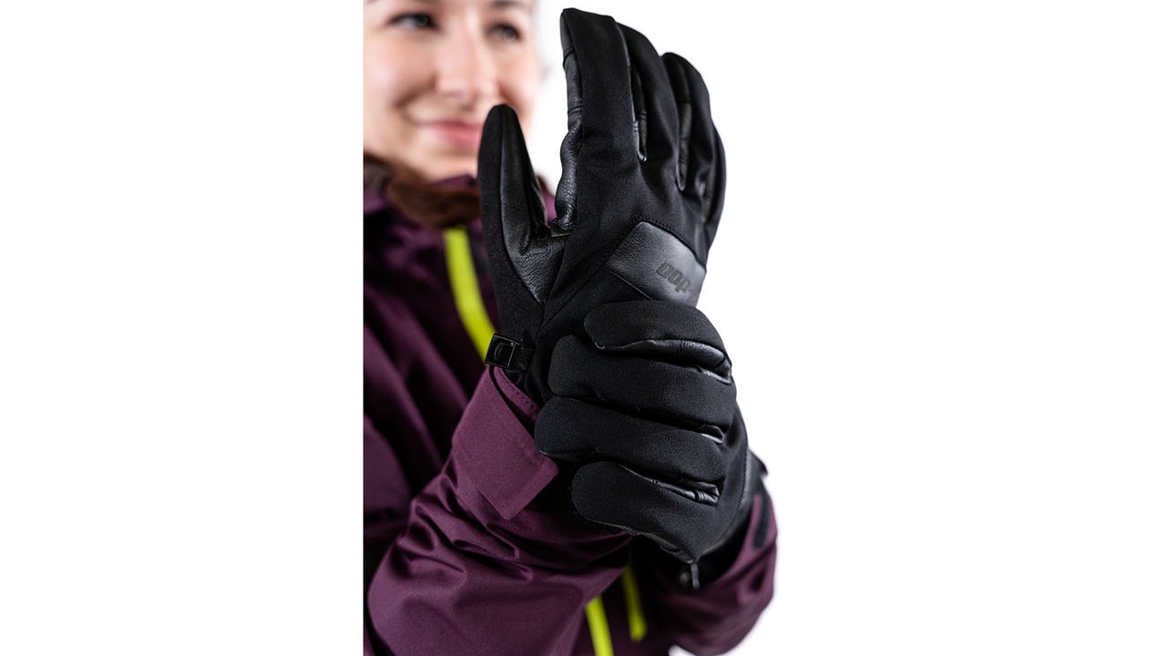Ski-Doo model wearing gloves