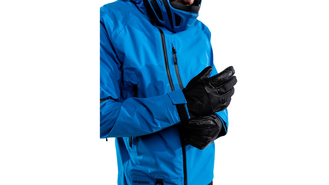 Ski-Doo model wearing gloves