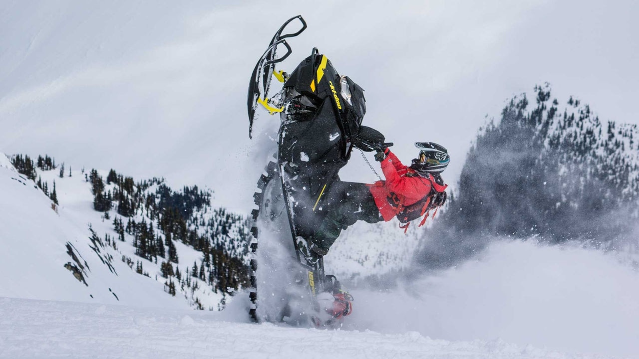 Craig McMorris doing a wheelie with his Ski-Doo Snowmobile
