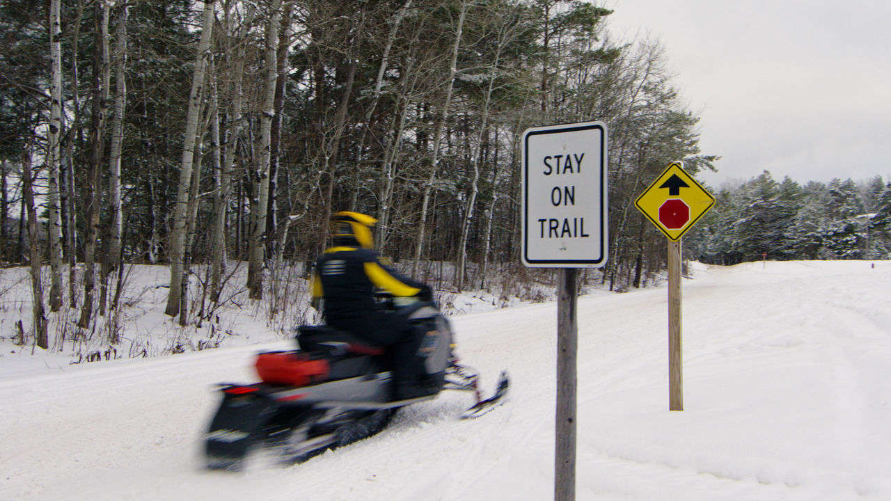 Ski-Doo Snowmobiler on a trail