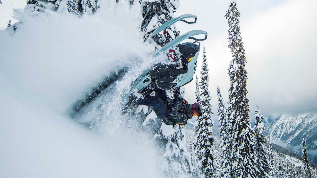Man making a jump with his 2024 Ski-Doo Freeride