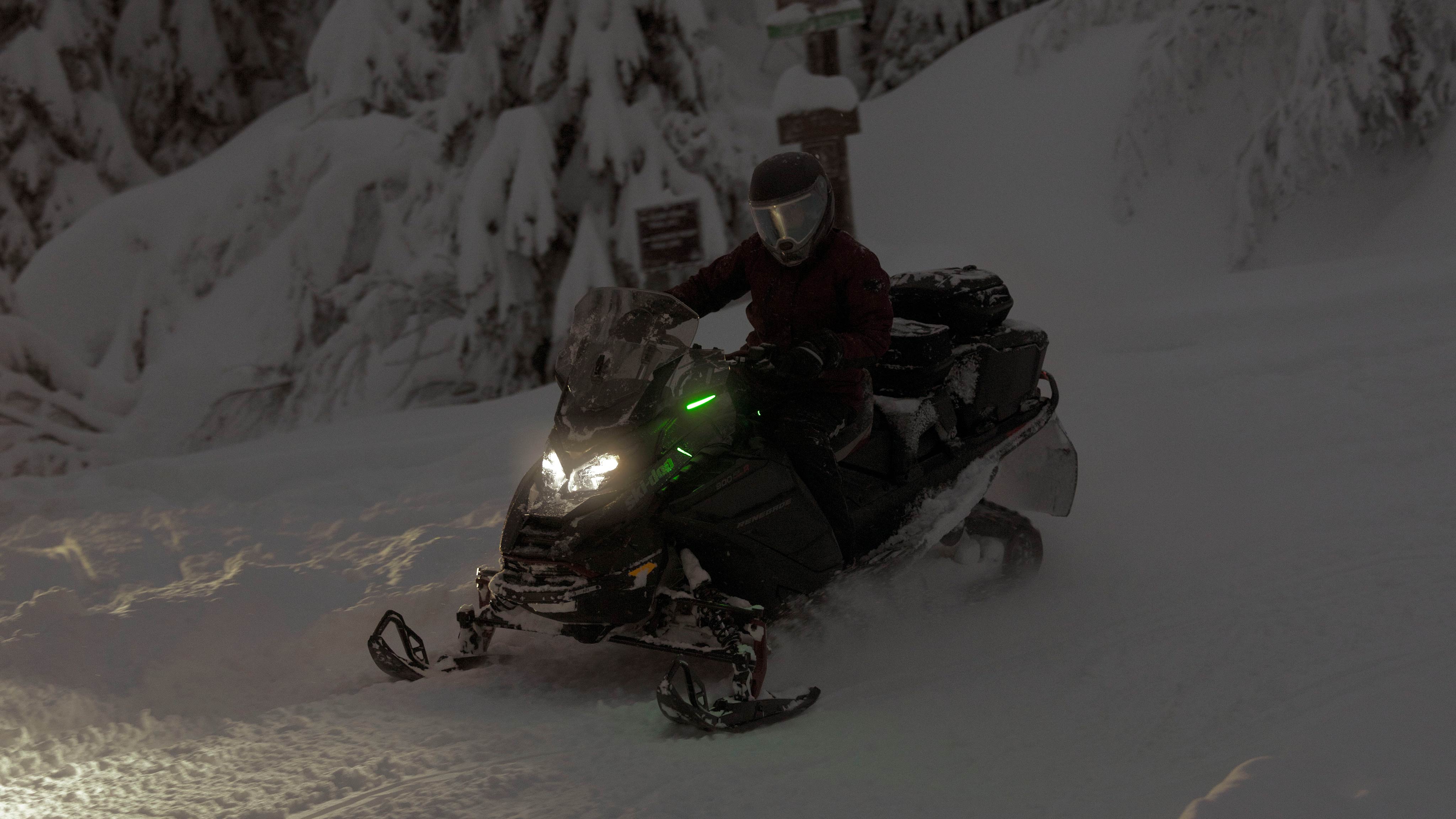 2025 Ski-Doo Renegade trail snowmobile riding at night
