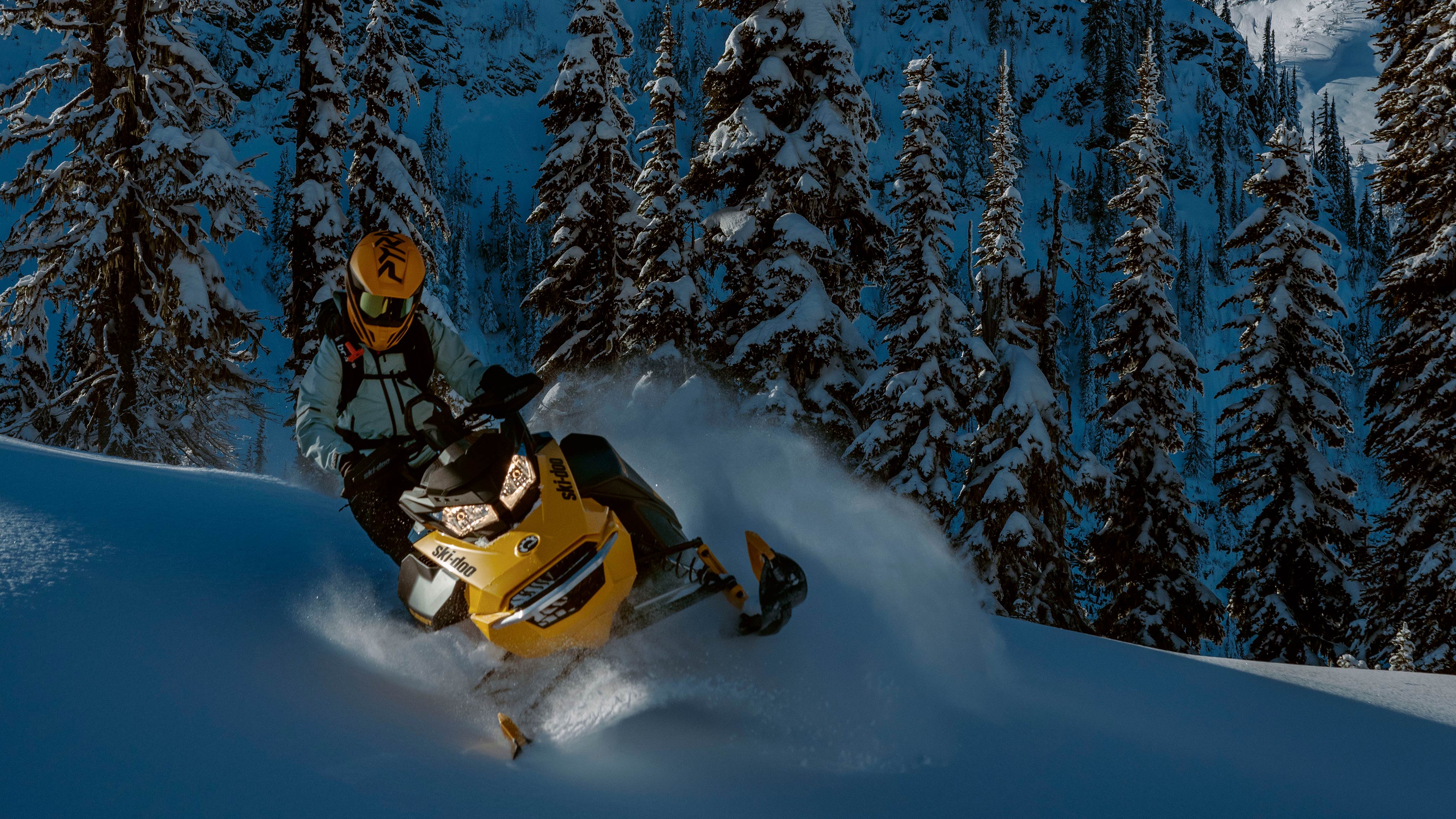 2025 deep snow snowmobile Ski-Doo NEO+ riding on one ski