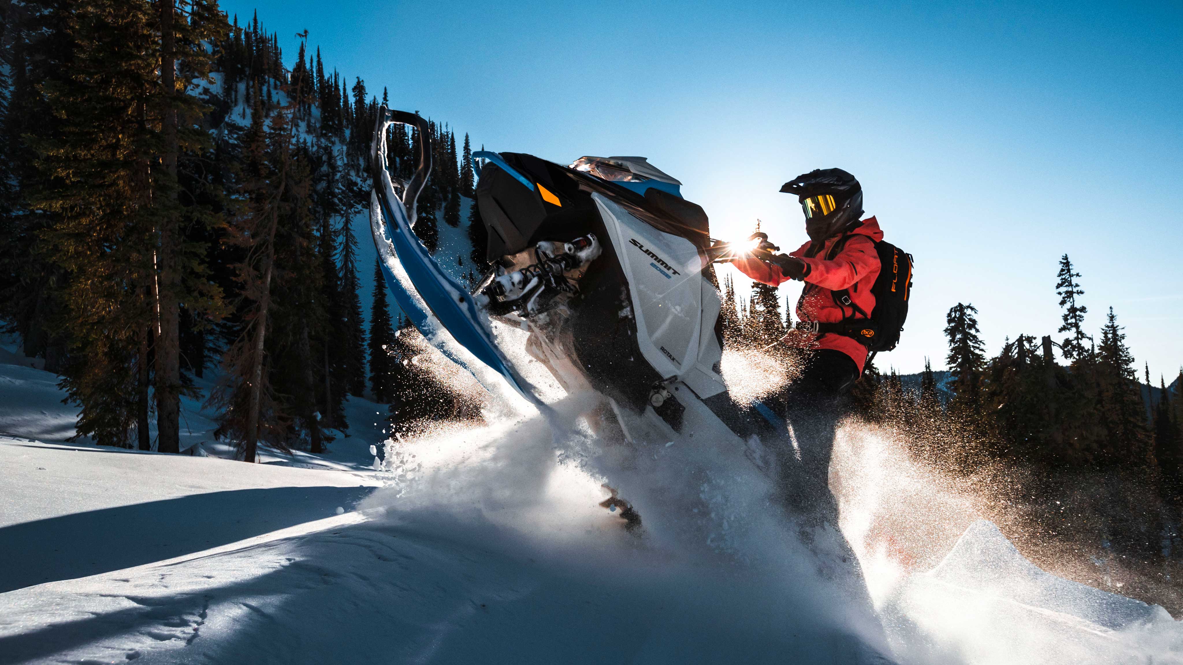 Man riding a 2022 Ski-Doo Summit in Deep-Snow