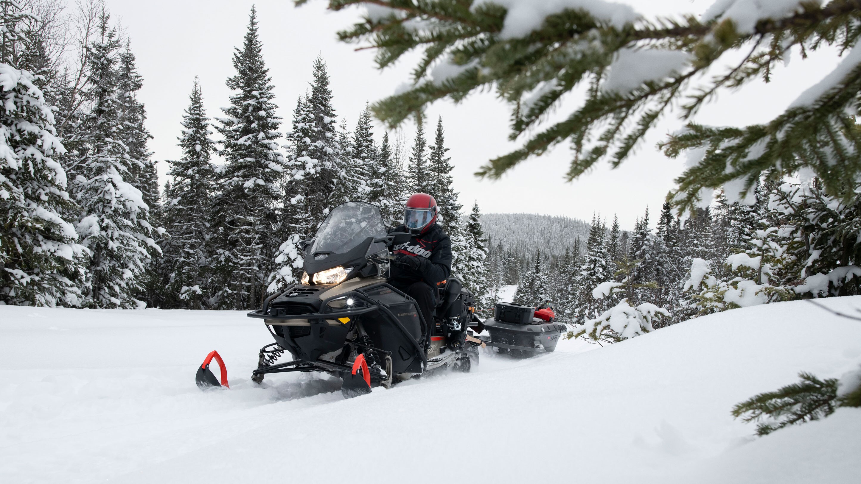  2022 Ski-Doo Expedition towing a sleigh