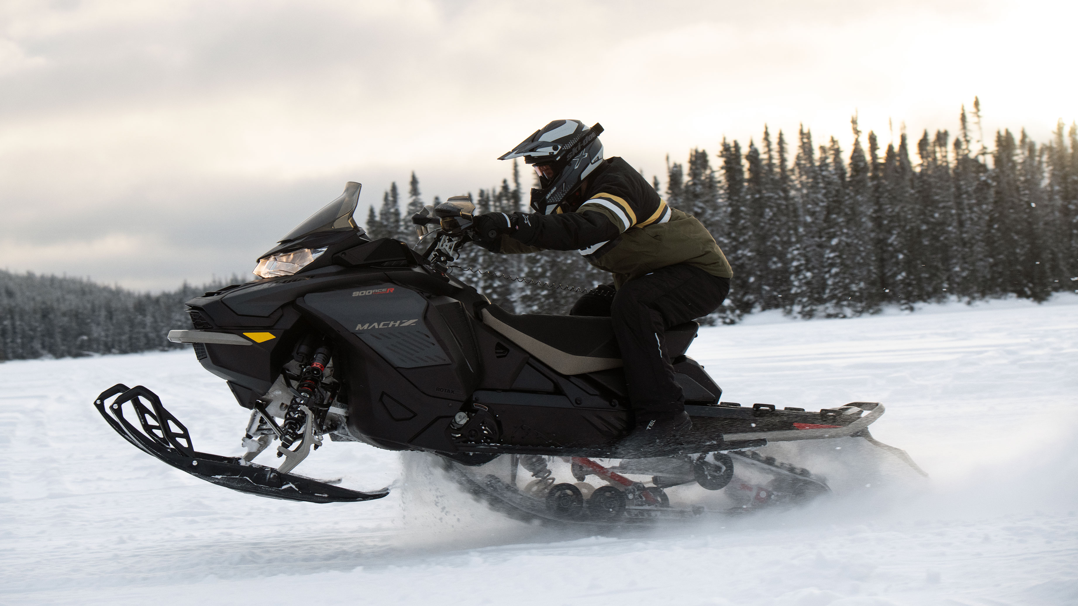 Men on his Ski-Doo MACH Z activating the Launch Mode