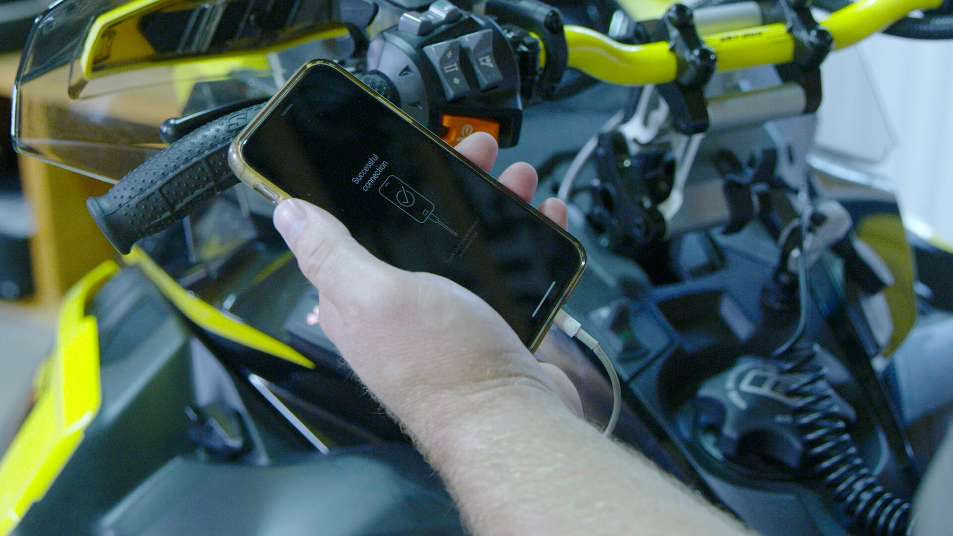 Troy Oleson using BRP GO! App with his Ski-Doo snowmobile