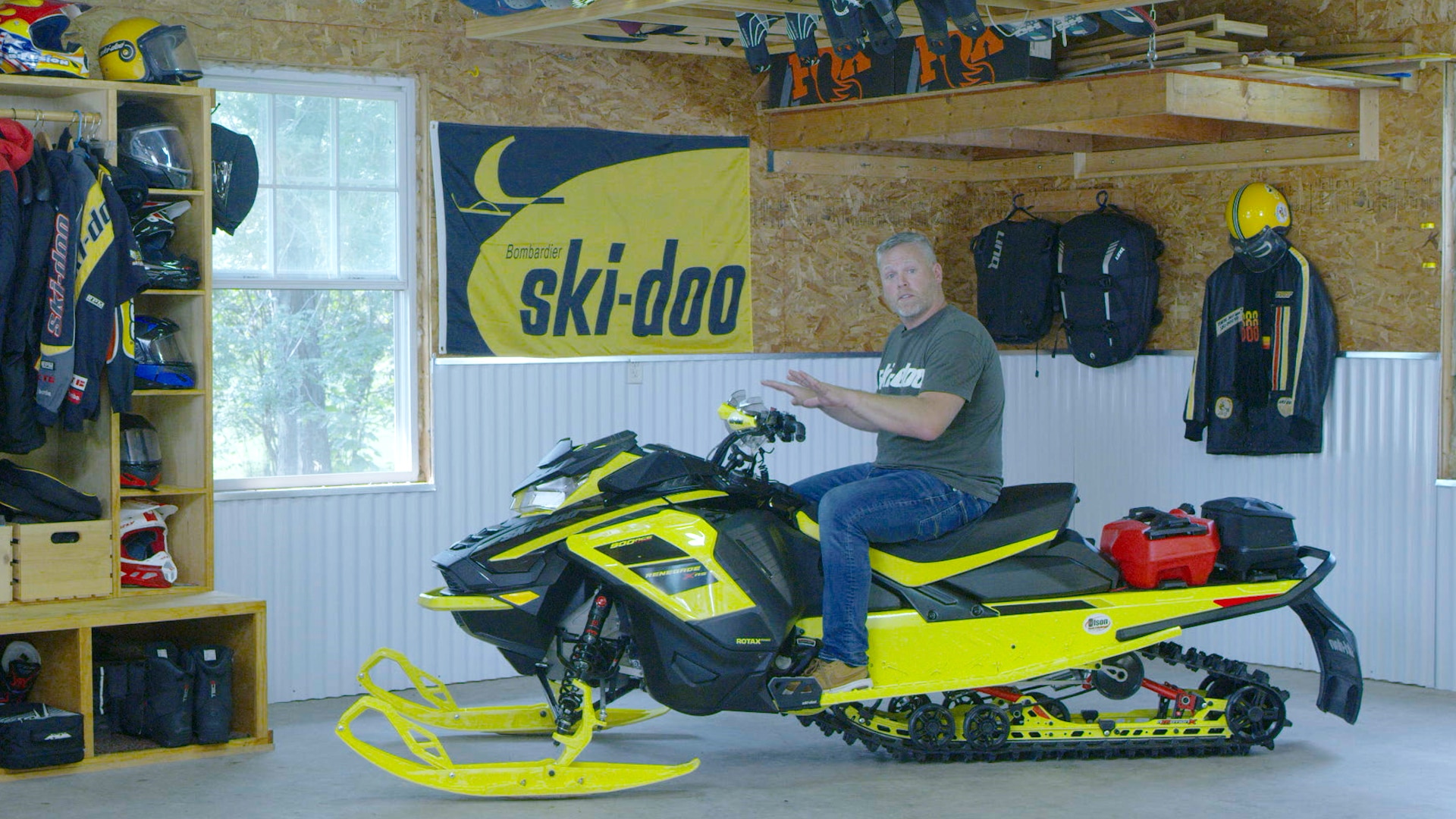 Ski-doo ambassador Troy Oleson sitting on his sled