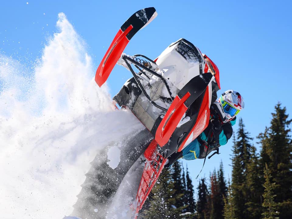 Ashley Chaffin performing a stunt with her Ski-Doo