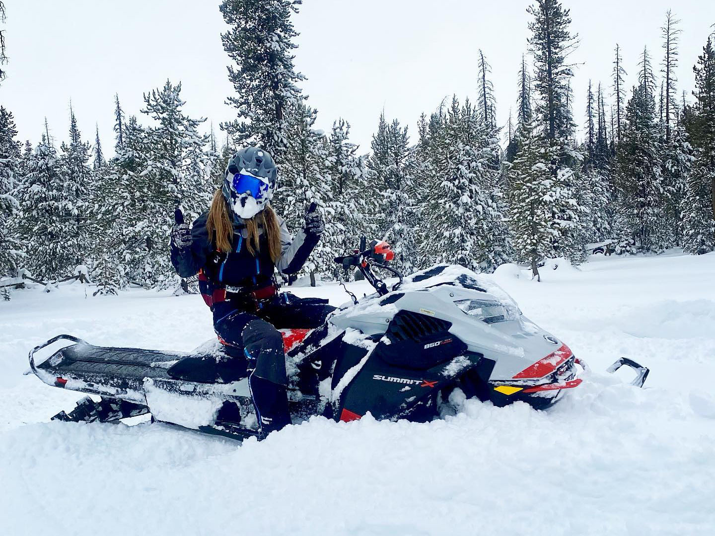 Stefanie Dean enjoying Deep-Snow with her Ski-Doo Summit
