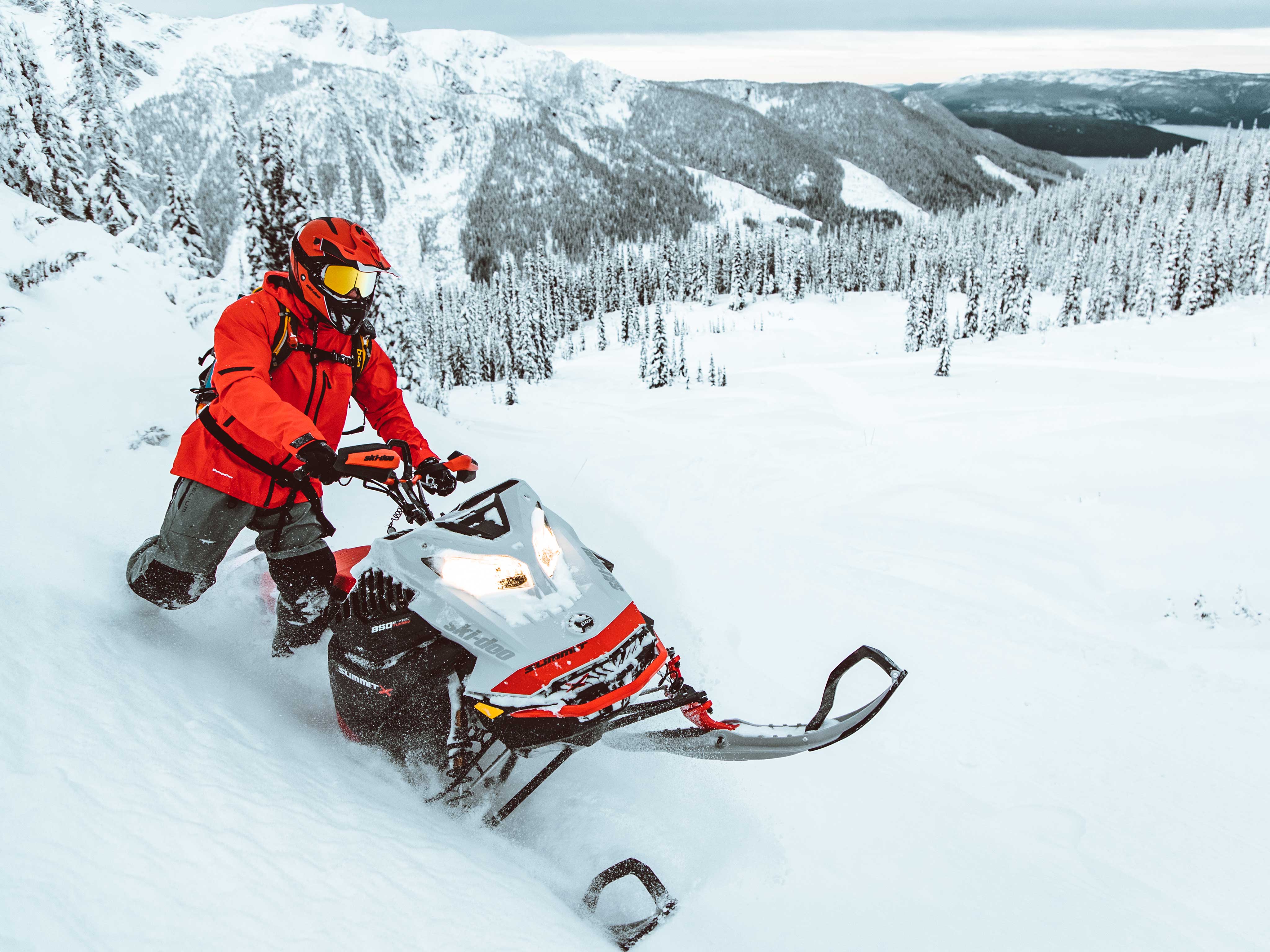 Tony Jenkins, Ski-Doo ambassador, riding his snowmobile in deep snow