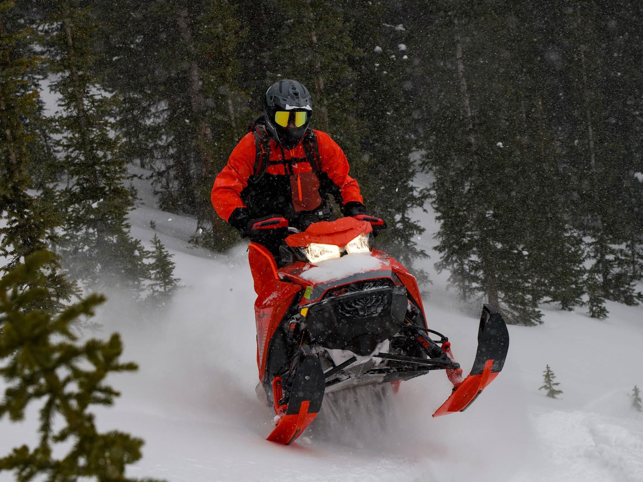 Ski-Doo Ambassador Troy Oleson riding a snowmobile