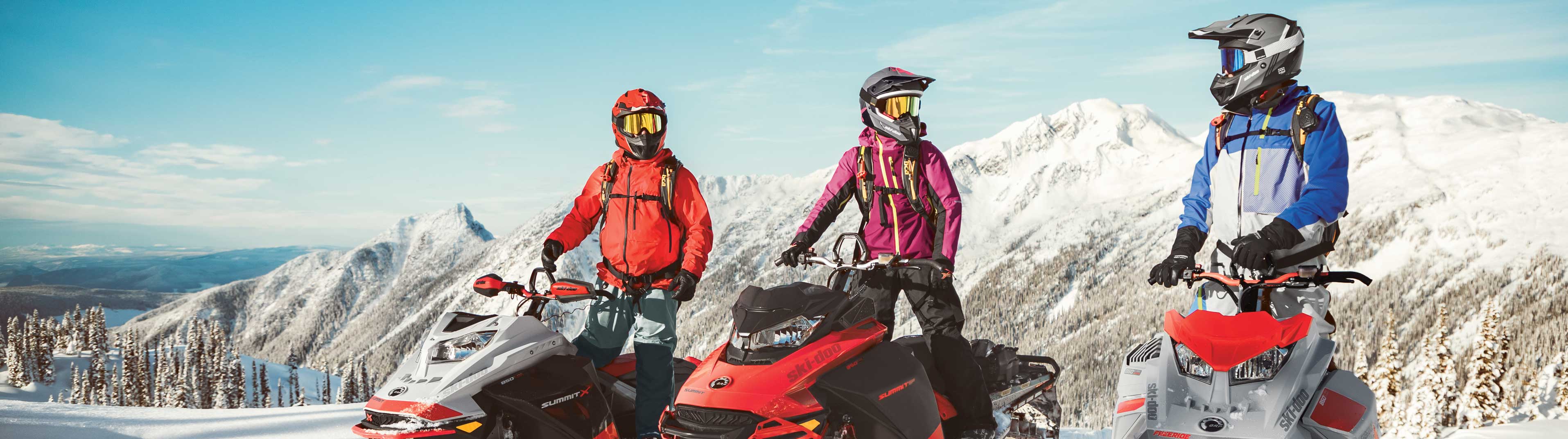 3 riders enjoying a snowmobile ride with Ski-Doo