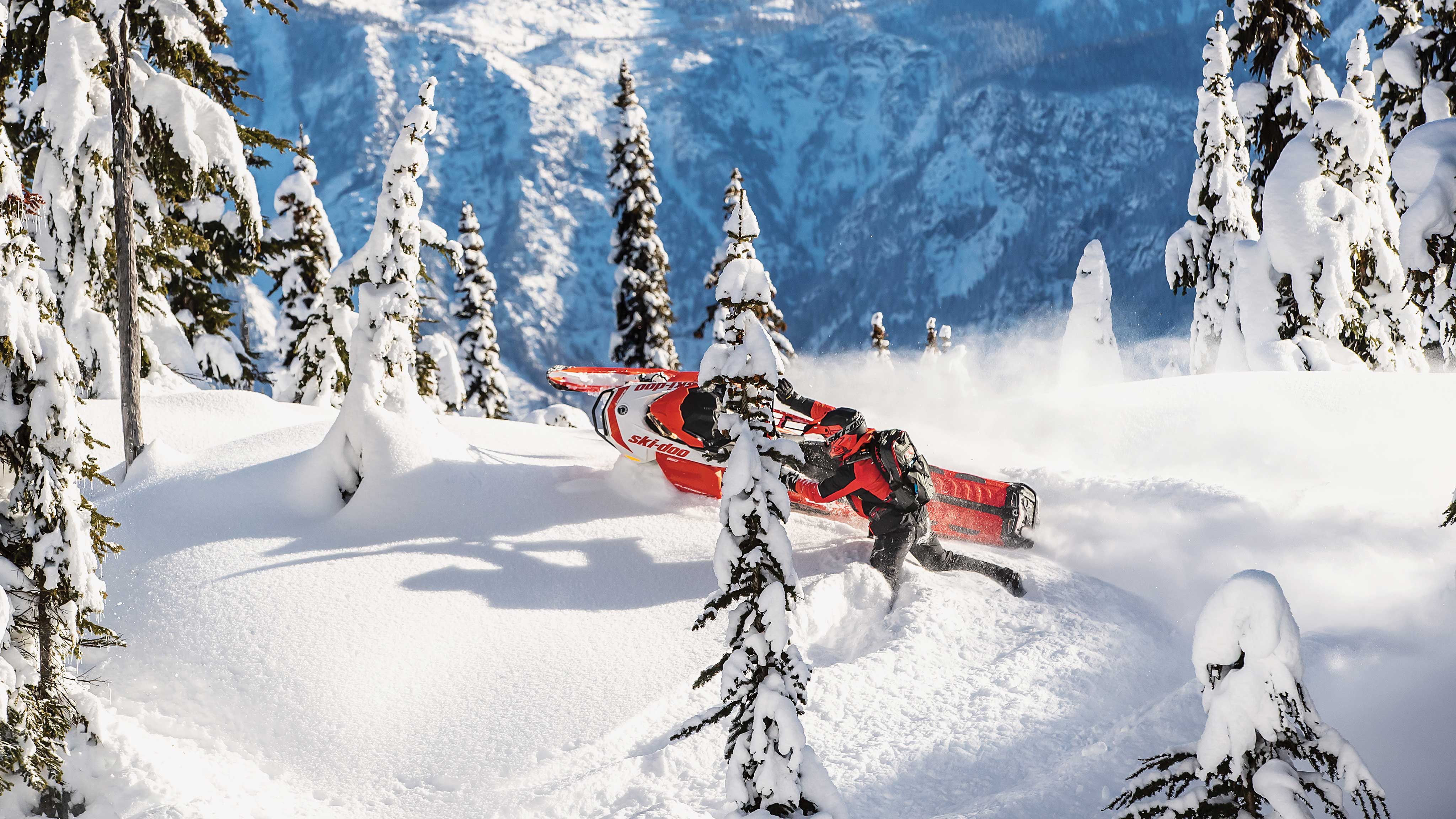 Rider enjoying Deep-Snow with a Ski-Doo Summit Expert