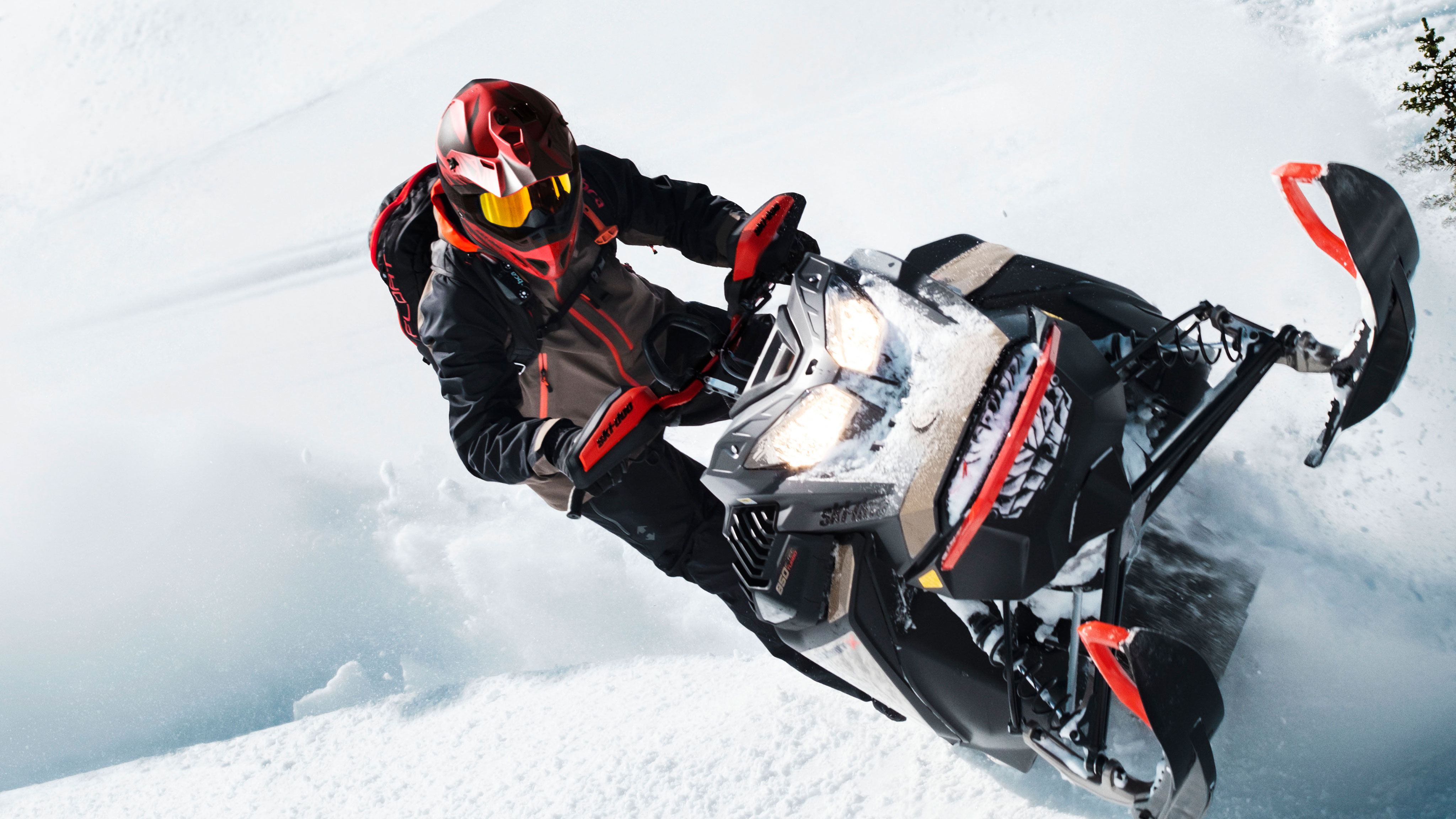 Man having big thrills in deep snow with his Ski-Doo Summit