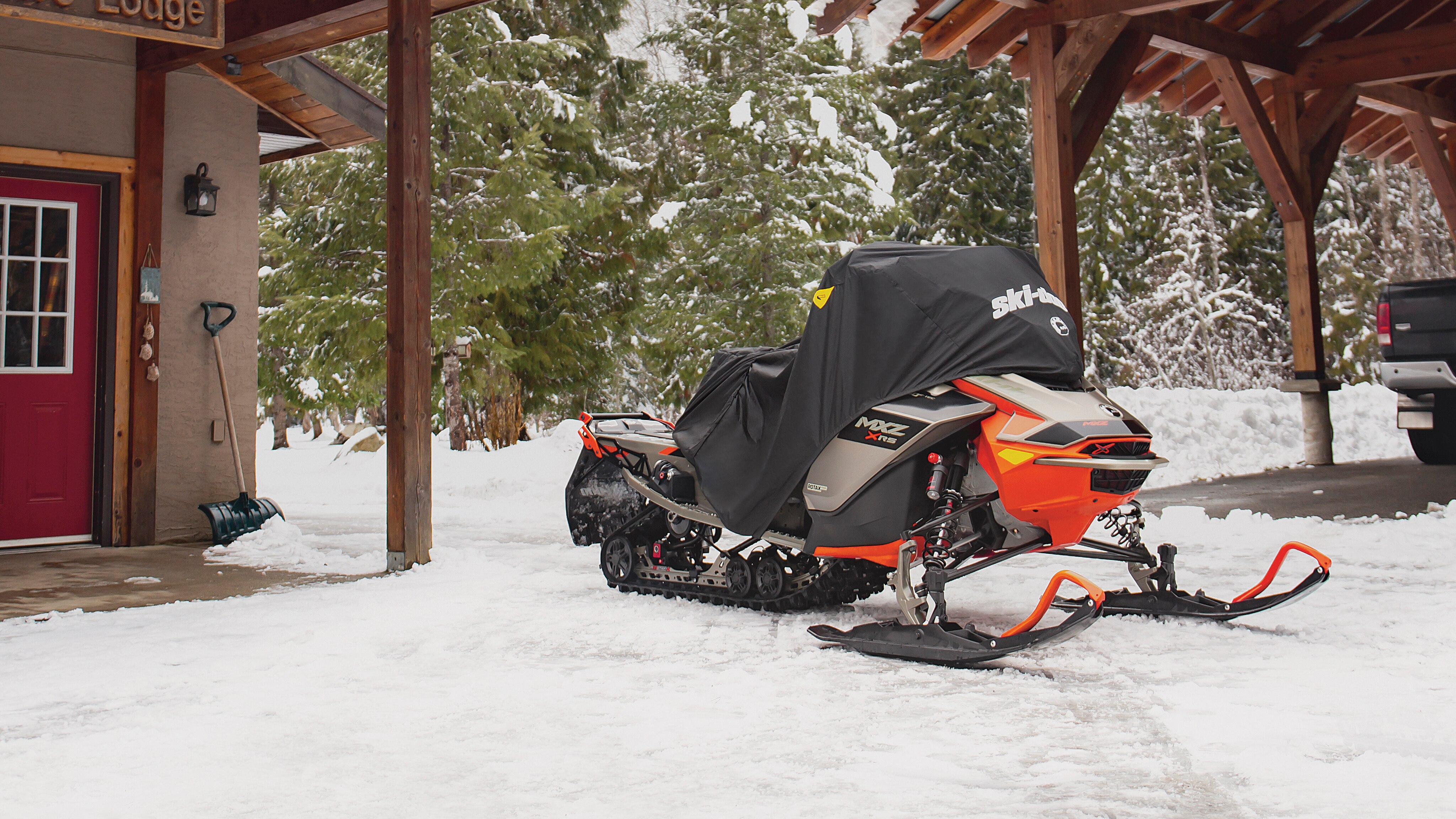 Ski-Doo MXZ snowmobile with a cover on