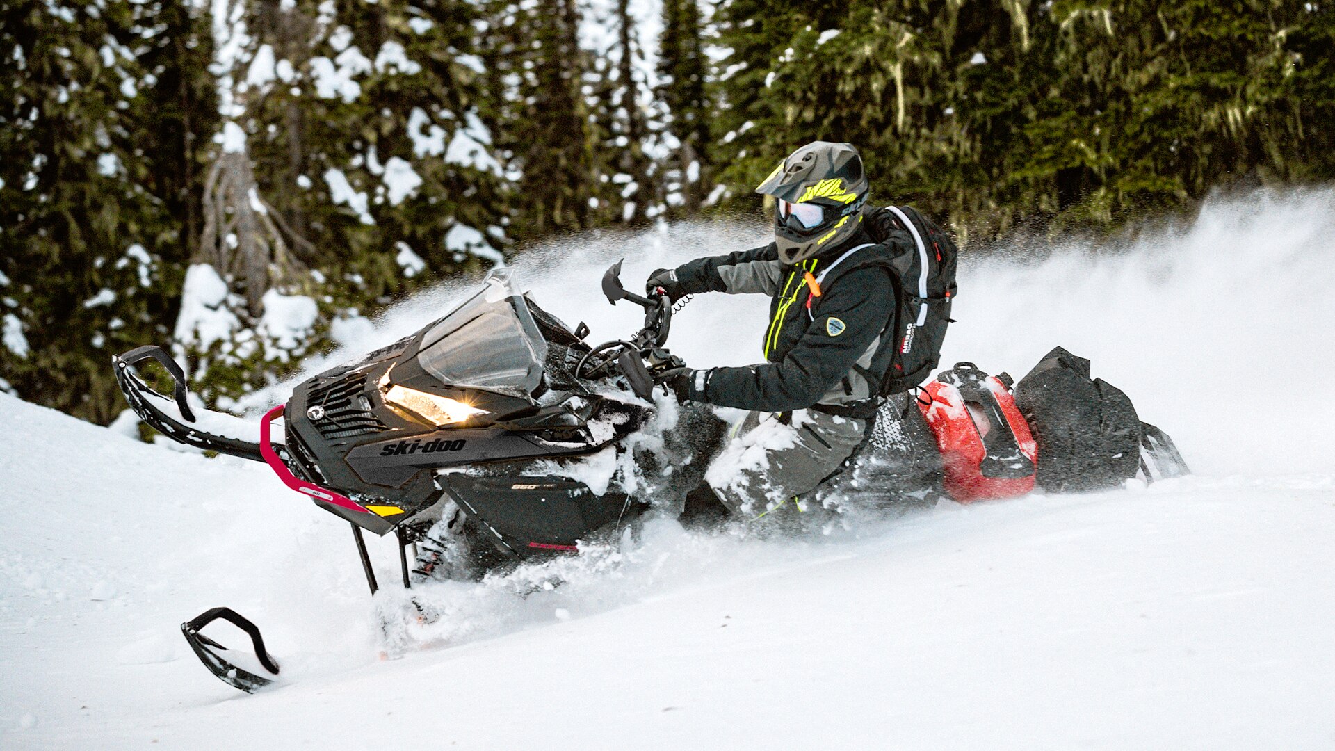 Man riding a Ski-Doo Expedition Xtreme in deep snow 