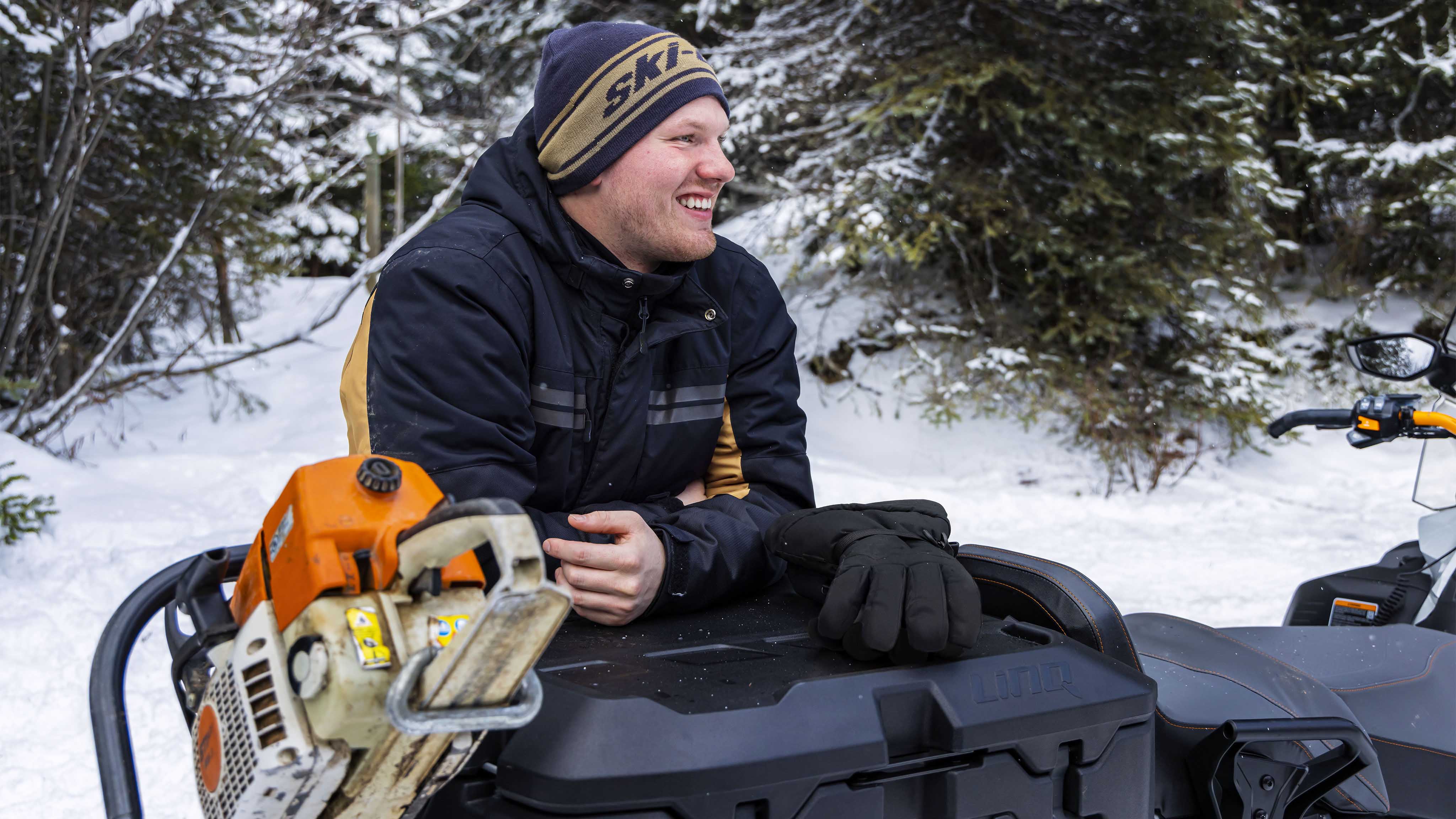Man wearing the Ski-Doo Warmth in Trail gear collection