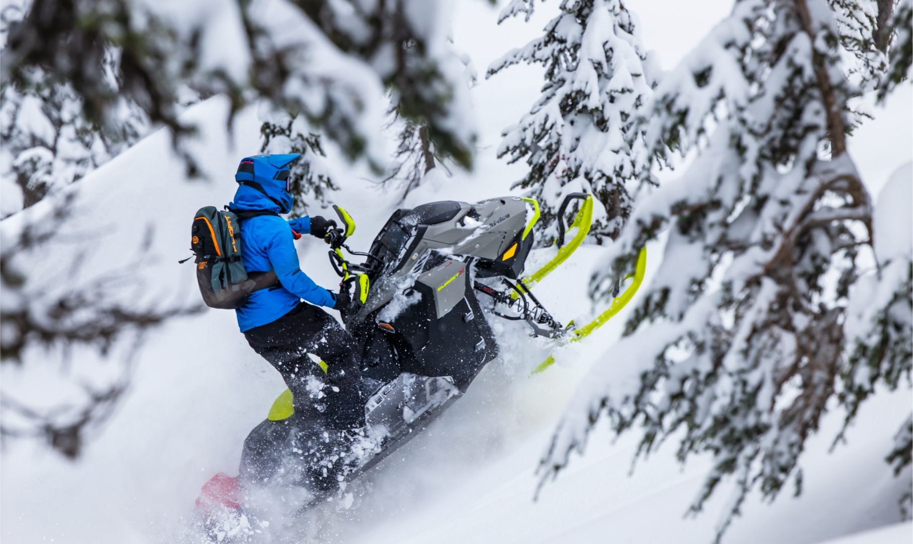 Man riding a Summit Ski-Doo